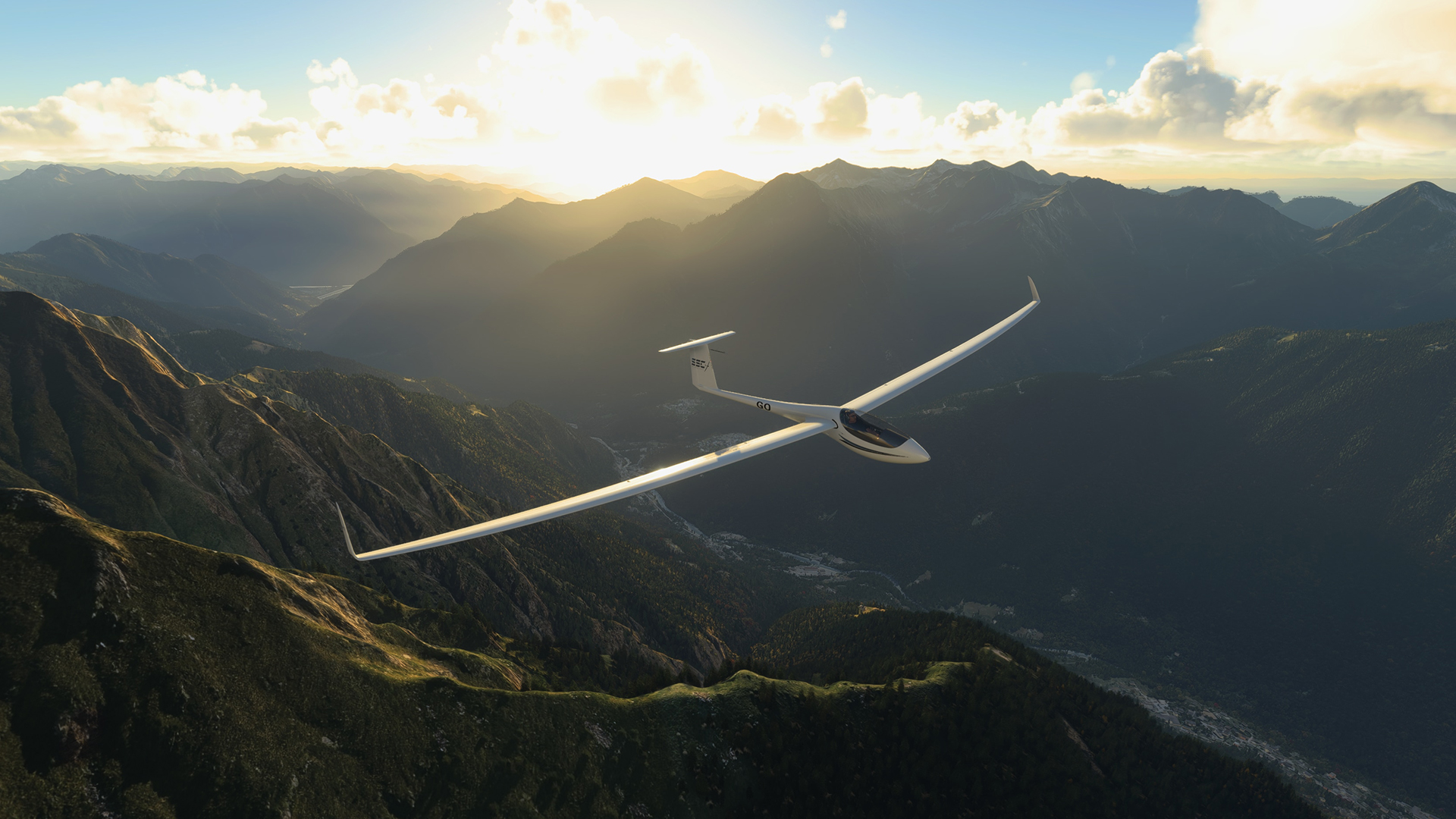 A glider flying above an alpine valley in Microsoft Flight Simulator
